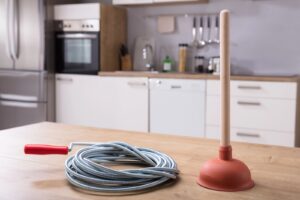 Plumbing tools in apartment kitchen